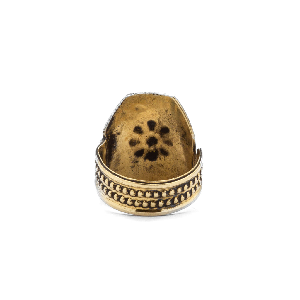 Back view of Arwa brass ring, highlighting adjustable opening and craftsmanship detail