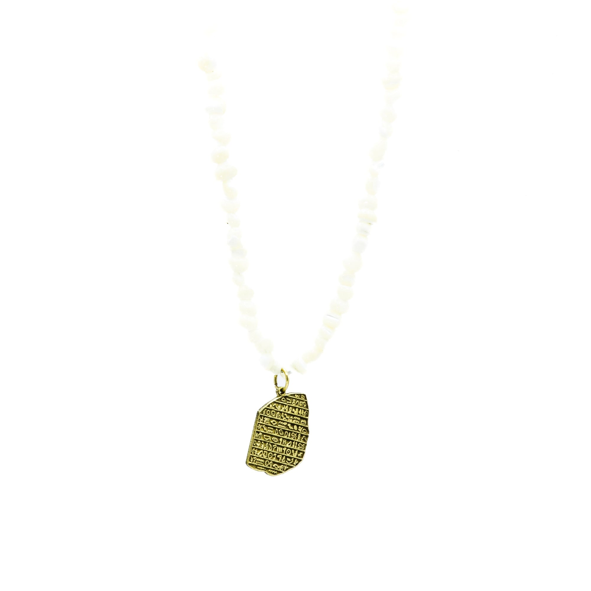 Handmade Egyptian brass pendant on seashell chain, front view showing textured ancient-inspired design