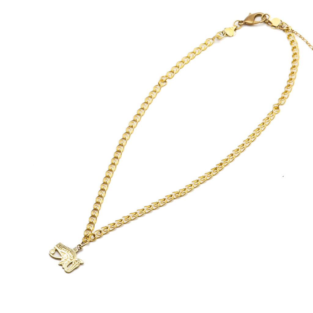 ide view of Magda handcrafted Egyptian brass medallion necklace, showing adjustable 40/45cm chain and dimensional pendant profile