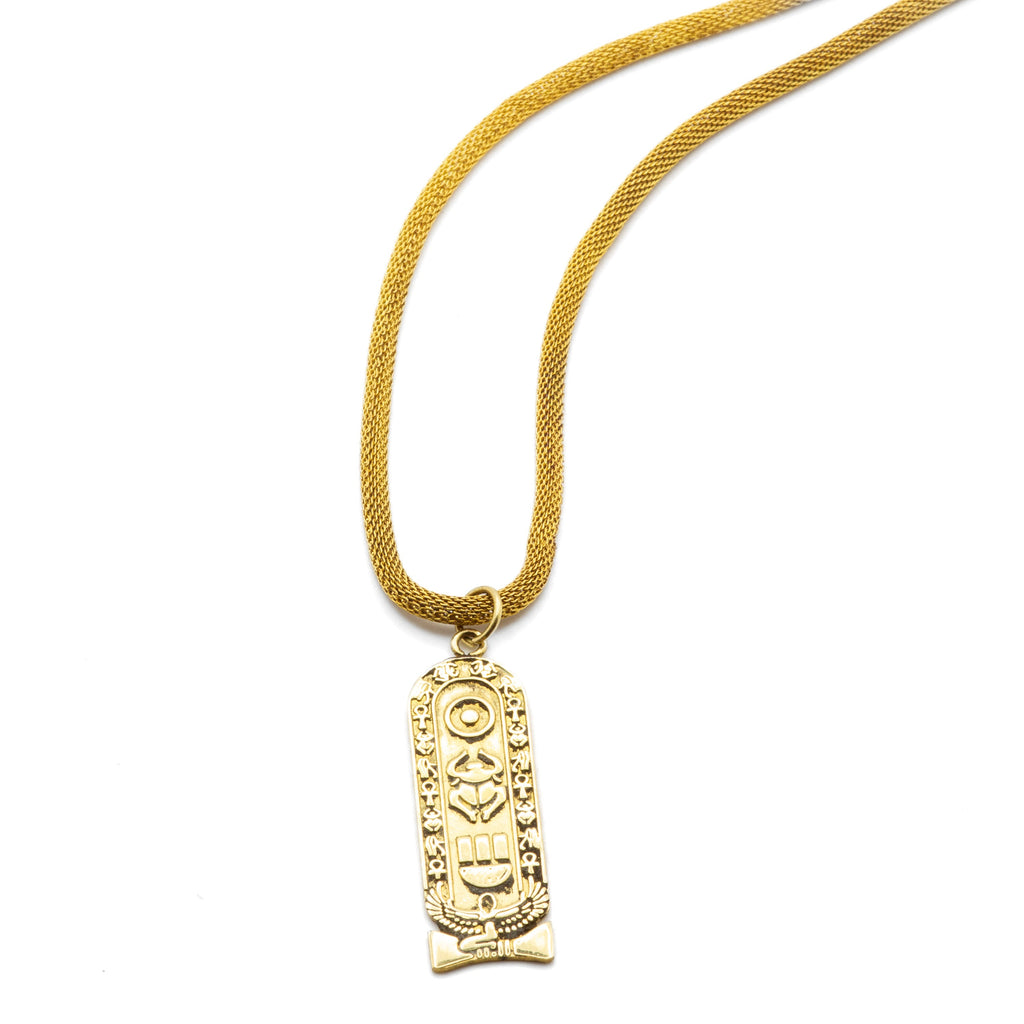 Front view of Mona sculptural Egyptian brass necklace, showing geometric form and hand-finished surface