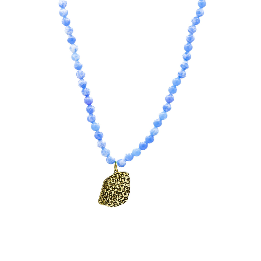 Handmade Egyptian brass necklace with blue beads and gold pendant inspired by ancient Cairo craftsmanship
