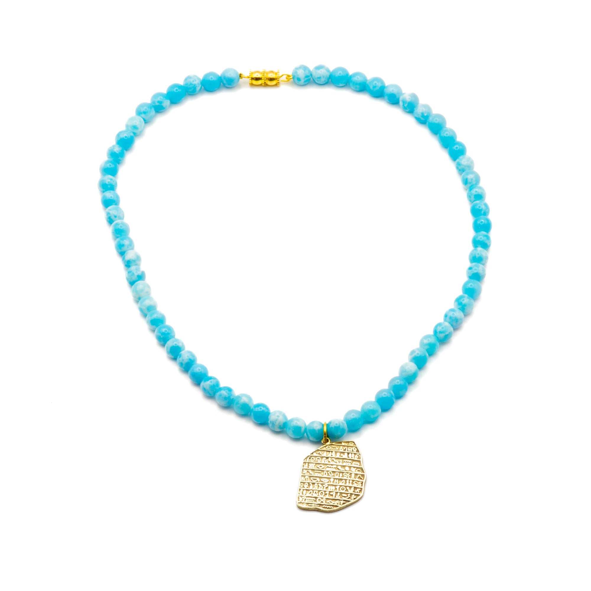 Rounded view of handmade Egyptian brass necklace showing full shape and pendant proportions