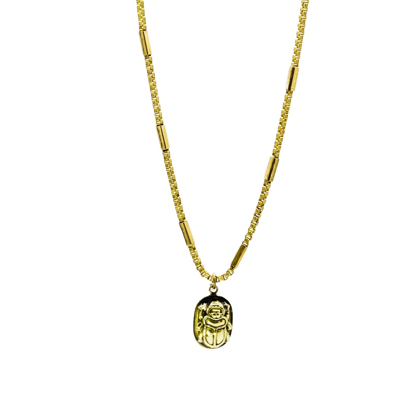 Full length view of Zahra adjustable brass chain with hand-finished link detail and natural patina